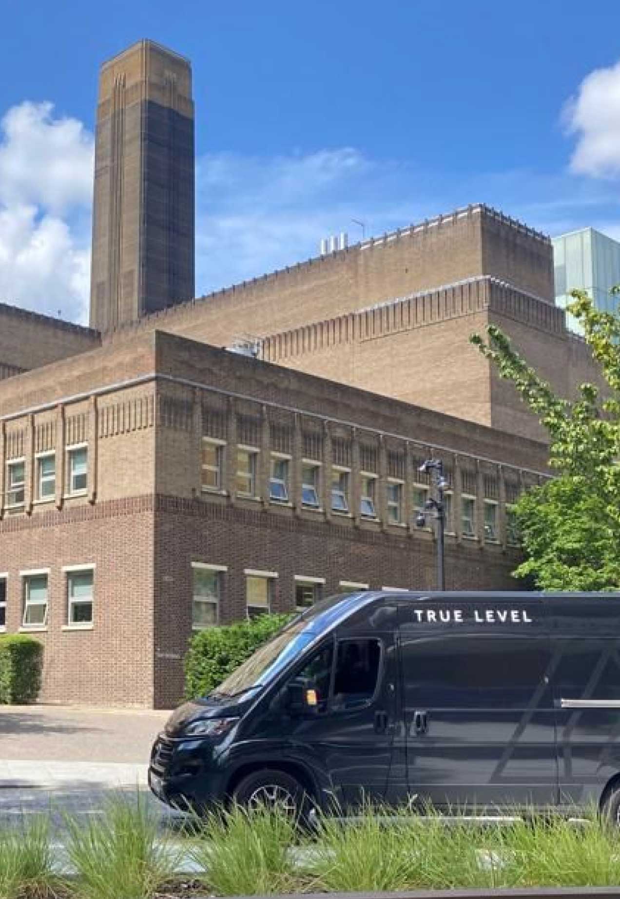 True Level Art Handling van parked in front of the Tate Modern Gallery.